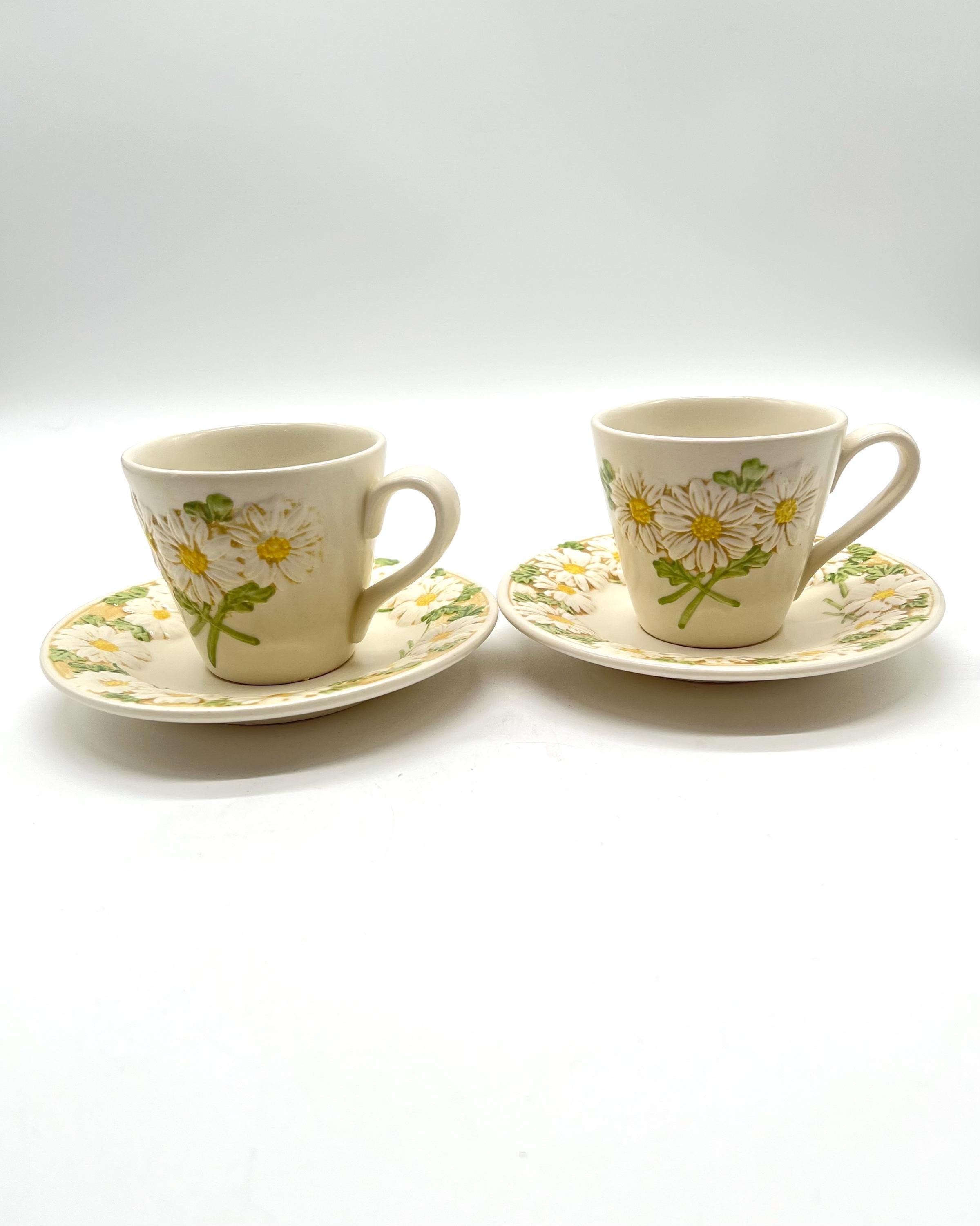 Metlox Poppytrail Sculptured Daisy Flat Cup and Saucer Pair