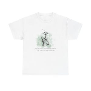 May include: White t-shirt with a graphic illustration of two figures with a sword, set against a green watercolor-style background. The text "THE BLOOD OF THE MARTYRS IS THE SEED OF THE CHURCH" is printed below the graphic.