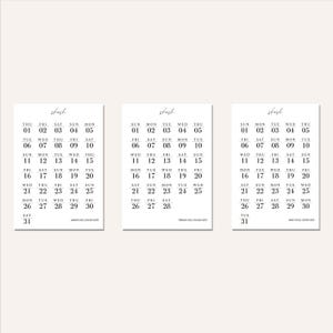 May include: Three minimalist calendars with a clean, modern design. Each calendar displays a month's dates in a simple, easy-to-read format, with the days of the week across the top. The calendars are in black and white.