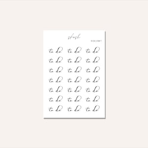 May include: A sheet of white paper with black text that says "skosh" and "TO DO | FONT 1". The sheet is filled with 18 "to do" stickers in a cursive font.