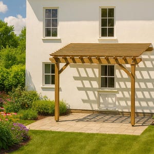 May include: A wooden pergola with a slatted roof stands in front of a white house with multiple windows. The pergola is supported by four wooden posts and casts a shadow on the stone patio. Colourful flowers and green grass surround the house.
