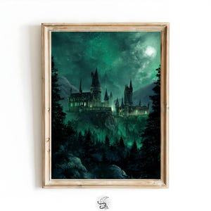 May include: Framed print of a castle at night, illuminated in green. The artwork features a detailed depiction of the castle with multiple towers and turrets, set against a starry sky. The frame is a light wood color. Text at the bottom reads "Witchcrafting Wonders, High Quality Printable Art."