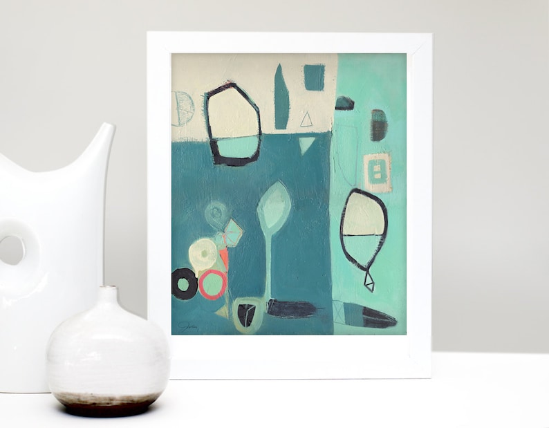 May include: Abstract painting with geometric shapes in shades of blue, green, white, and black. The painting is framed in white and has a white mat.
