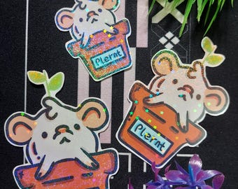 Pegatina de vinilo de un lindo ratón amigo de las plantas