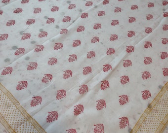 white cotton mull hand block printed with border in mustard and body in red