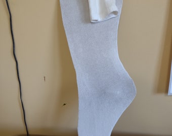 Fitsall cotton stockings that stretch in all directions and should go above the knee. extra large cotton stocking.