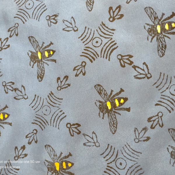 for the Bee lover at heart. A scarf full of bee hives and bees with gold metalic stripes.  This scarf is custom made.