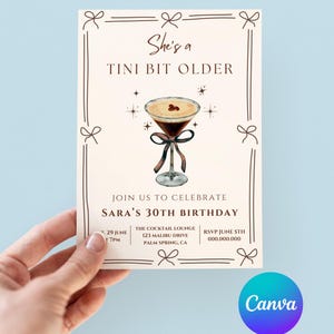 May include: A birthday party invitation with a brown and white color scheme. The invitation features a cocktail glass with a brown drink and a brown ribbon. The text on the invitation reads "She's a Tini Bit Older" and "Sara's 30th Birthday".