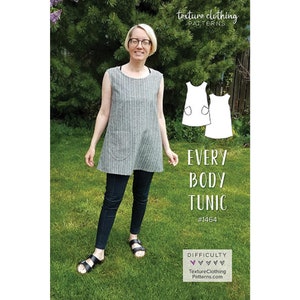 May include: A woman wearing a grey and white striped tunic with two front pockets, paired with dark blue jeans and black sandals. The image includes a pattern design for the "Every Body Tunic" with the difficulty level indicated.