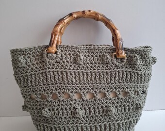 Crochet handbag with bamboo handles