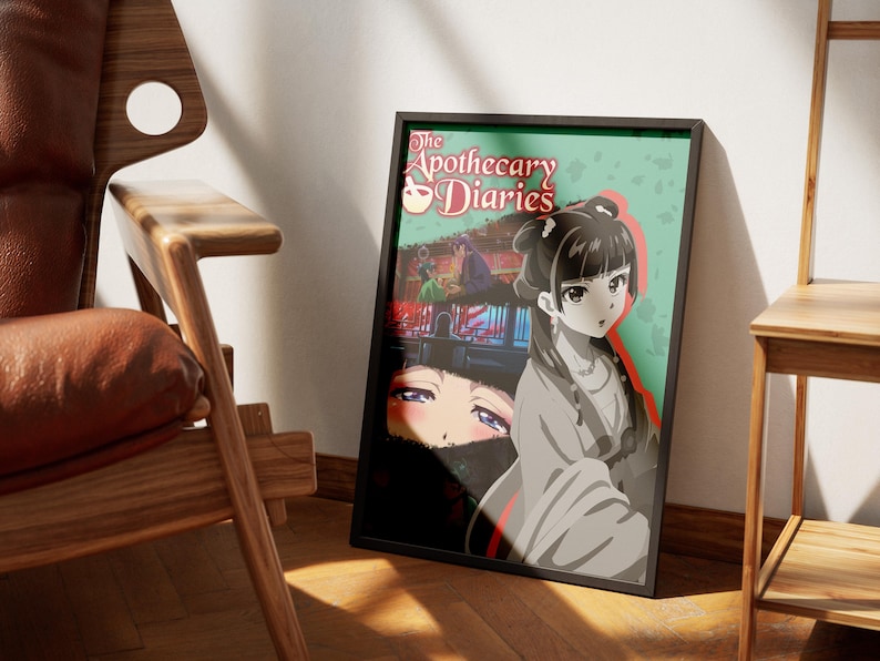 May include: Framed poster featuring anime-style artwork from "The Apothecary Diaries." The poster has a black frame and depicts a woman in traditional clothing, with the title text at the top. The background is a mix of colors.