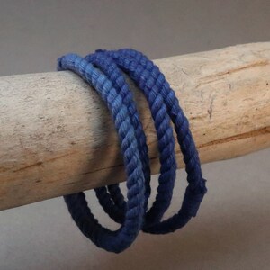 blue string rope bracelets on display bar by WhatKnotShop on ETSY
