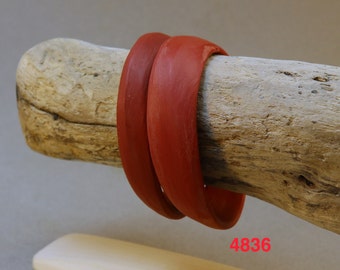 pair of small red oval bangles 4836