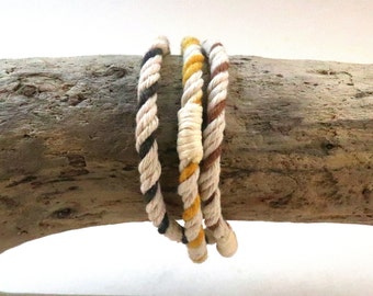 Three string bracelets 4944