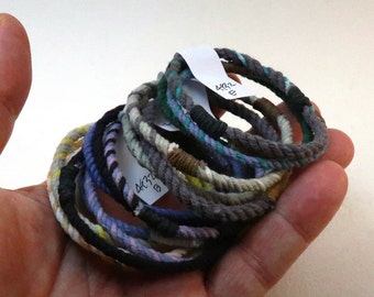 three thin string bracelets 4932