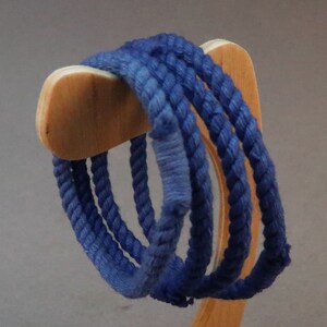 group of blue string rope bracelets by WhatKnotShop on ETSY