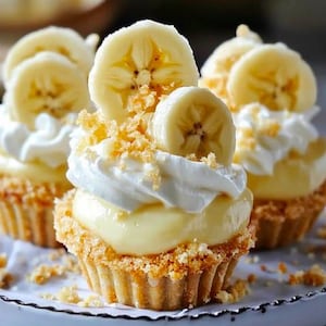Najlepszy przepis na mini tarty z kremem bananowym bez pieczenia. Natychmiastowe pobranie najlepszego przepisu.