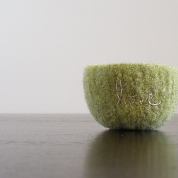 fuzzy felted pale pistachio green wool bowl with the word love embroidered in cream
