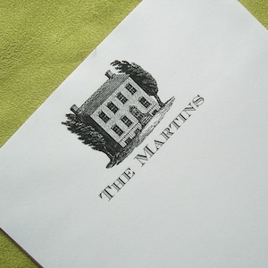 May include: Black and white illustration of a house with a fence and trees. The text "THE MARTINS" is below the image.