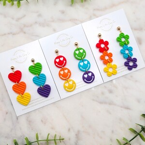 Rainbow Heart Daisy Smiley Trio Clay Earrings | Pride Statement Earrings | LGBTQ+ Earrings | Pride Month Jewelry | Gay Pride Gift | Handmade