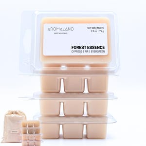 May include: A white ceramic mug with a black handle and the text "But First, Coffee" in a black, handwritten-style font. The mug is on a white surface.