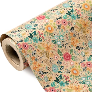 May include: A roll of floral wrapping paper. The paper features a tan background adorned with a repeating pattern of colourful flowers in pink, orange, blue, and green. The paper is rolled, revealing the inner cardboard tube.