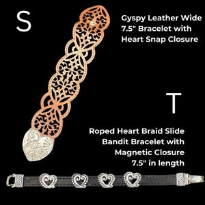 May include: Two bracelets are displayed against a black background. The first is a wide, openwork copper-colored leather bracelet with a heart snap closure. The second is a black leather bracelet with heart-shaped silver accents and a magnetic closure. Both bracelets are 7.5 inches in length.