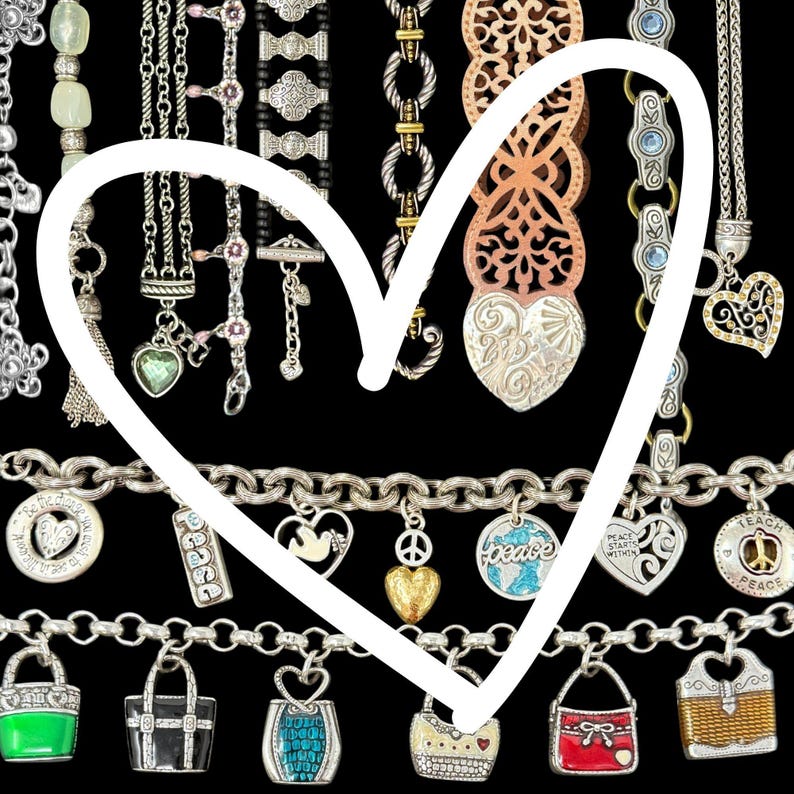 May include: A collection of silver-toned charm bracelets and necklaces with various pendants, including hearts, purses, and peace symbols. The charms feature intricate designs and colorful accents, set against a black background.