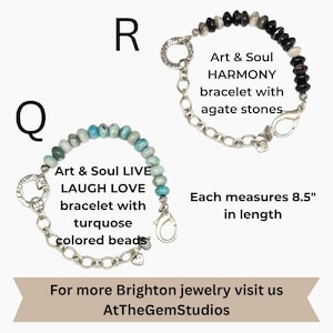 May include: Two bracelets are displayed. One is an "Art & Soul LIVE LAUGH LOVE" bracelet with turquoise beads. The other is an "Art & Soul HARMONY" bracelet with agate stones. Each bracelet measures 8.5 inches in length.