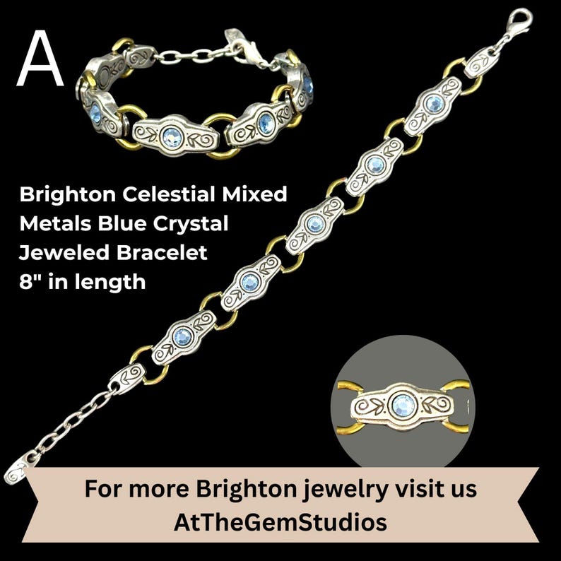 May include: A silver and gold-toned bracelet with blue crystal accents. The bracelet is 8 inches in length and features a celestial design. The text on the image reads "Brighton Celestial Mixed Metals Blue Crystal Jeweled Bracelet".