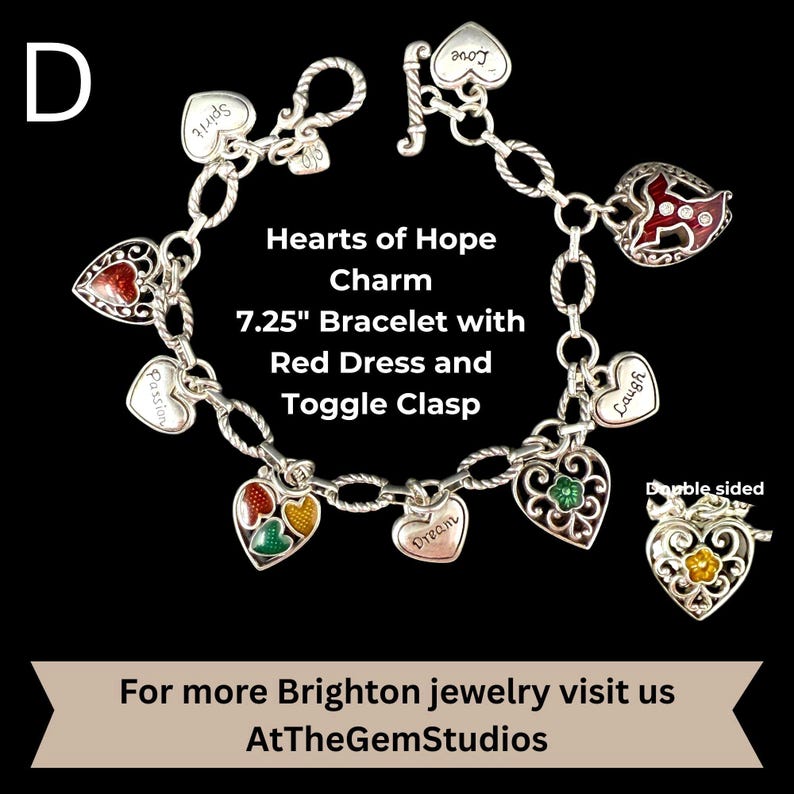 May include: A silver charm bracelet with heart-shaped charms. The bracelet is 7.25 inches long and features a toggle clasp. The charms include red, green, and yellow accents, and the text "Hearts of Hope Charm" is displayed.