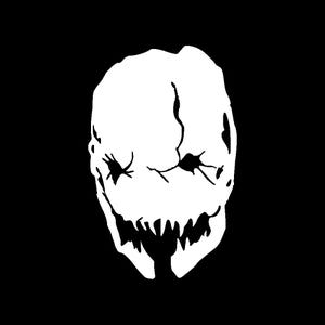 May include: A black and white illustration of a creepy, distorted face with a wide, toothy grin.