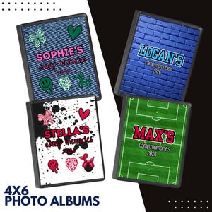 May include: Four rectangular photo albums with black spines. One features a blue denim print with green icons and text reading Sophie's camp memories 2026. Another has a blue brick wall print with text reading Logan's camp memories 2026. Two others feature white paint splatter or green soccer field prints with personalized names and camp memories 2026 text.