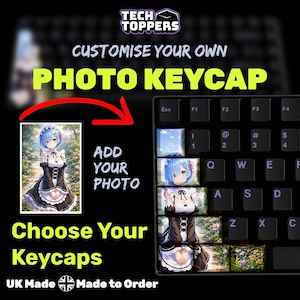May include: Black keyboard with custom photo keycaps. The image shows a sample keycap with a photo of an anime character. The text says "CUSTOMISE YOUR OWN PHOTO KEYCAP" and "CHOOSE YOUR KEYCAPS".