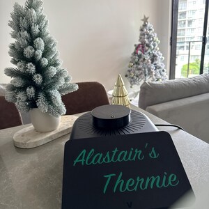Black 3D-Printed Motor Area Cover for Thermomix TM7.