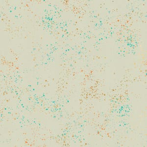 May include: A cream-colored fabric with a speckled pattern. The pattern features small, irregular dots in shades of teal, orange, and gold. The dots are scattered across the surface, creating a textured effect. This fabric is suitable for various craft projects.