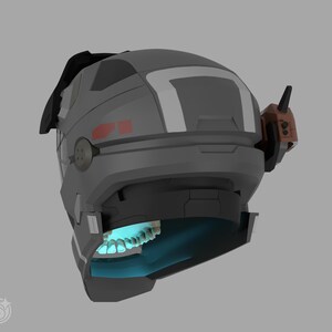 May include: A futuristic gray helmet with a black visor and a brown communication device on the side. The helmet has red accents and a glowing blue interior, revealing a set of teeth.