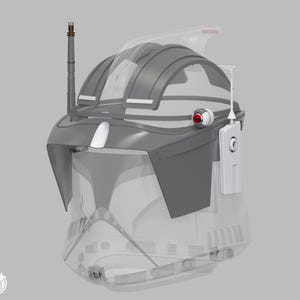 May include: A grey and white helmet with a transparent visor. The helmet features a rounded top with ridges, a white chin piece, and a red circular detail. It also has a tall antenna and a white rectangular device attached to the side.