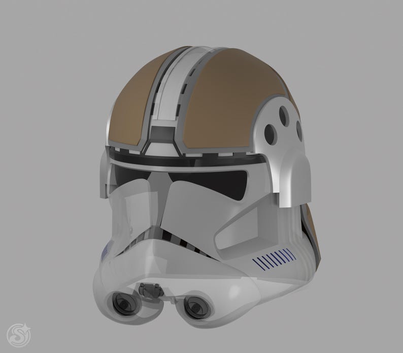 May include: A white and tan helmet with a visor and two eye pieces. The helmet has a tan top with a white stripe down the center. The helmet has a futuristic design with a series of vents and a chin piece.