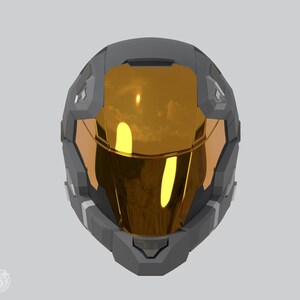 May include: A futuristic gray helmet with a gold visor. The helmet has a geometric design with angular panels and a reflective visor that covers the face. The overall design suggests a sci-fi or cosplay theme.