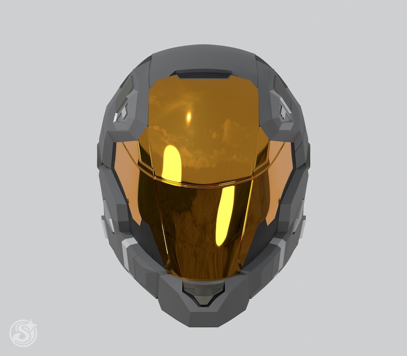 May include: A futuristic gray helmet with a gold visor. The helmet has a geometric design with angular panels and a reflective visor that covers the face. The overall design suggests a sci-fi or cosplay theme.