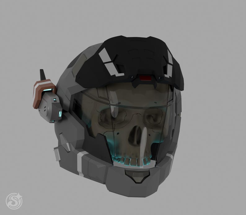 May include: A futuristic gray helmet with a black visor and accents. The helmet features a skull design visible through the visor. It has a communication device on the side and a black visor on top.