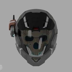 May include: A gray and black futuristic helmet with a skull-shaped visor. The helmet has a dark visor, a communication device on the side, and white accents. The design is reminiscent of a science fiction or military theme.