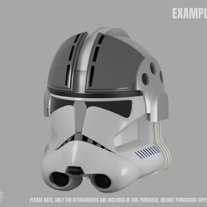 May include: A white and gray helmet with black accents, featuring a distinctive design with vents and a visor. The word "EXAMPLE" is printed in the upper right corner. The text at the bottom says "PLEASE NOTE, ONLY THE ATTACHMENTS ARE INCLUDED IN THIS PURCHASE, HELMET PURCHASED SEPERATELY."