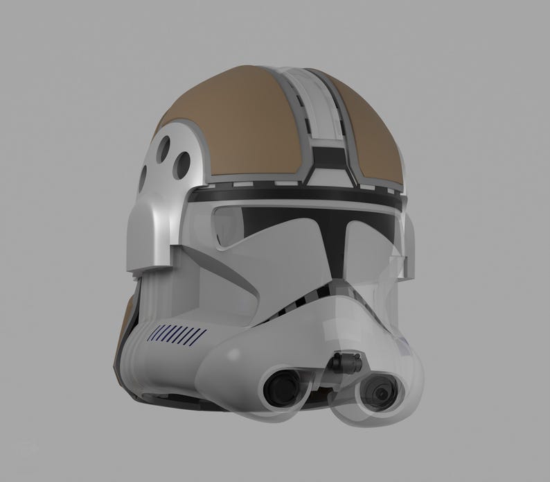 May include: A white and tan helmet with black accents. The helmet has a visor, two eye pieces, and a tan top. The helmet has a futuristic design and is likely for cosplay or display.