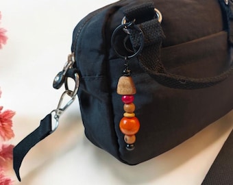 Bag charm and key ring made from upcycled wooden beads.