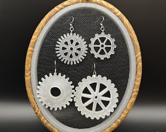 asymmetrical gear earrings in frosted transparent epoxy resin. Size M or L