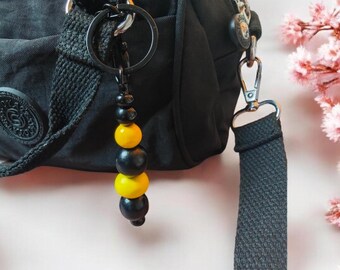 Bag charm and key ring made from upcycled wooden beads.