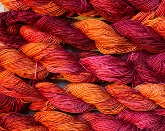 800 yards of pure wool yarn in sport weight, 5 skeins, 9 oz. hand dyed red and orange