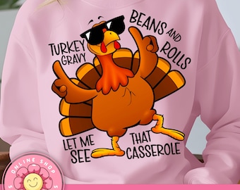 May include: Pink sweatshirt featuring a cartoon turkey wearing sunglasses and gesturing with its wings. Text includes "Turkey Gravy", "Beans and Rolls", "Let Me See", and "That Casserole". The design is a digital download file.